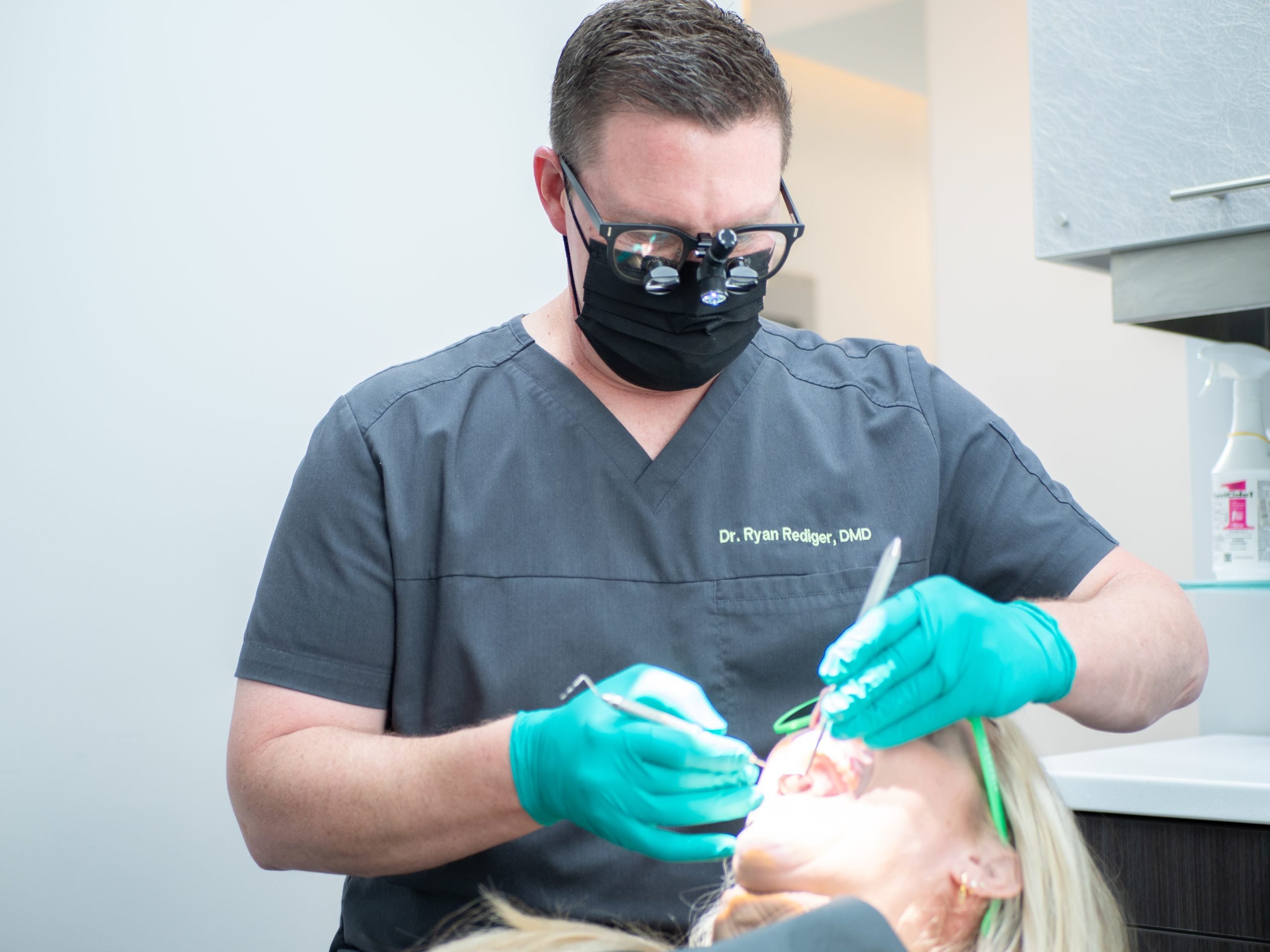 Gardenia Dentistry Company photos-233 Dr Rediger doing dental exam